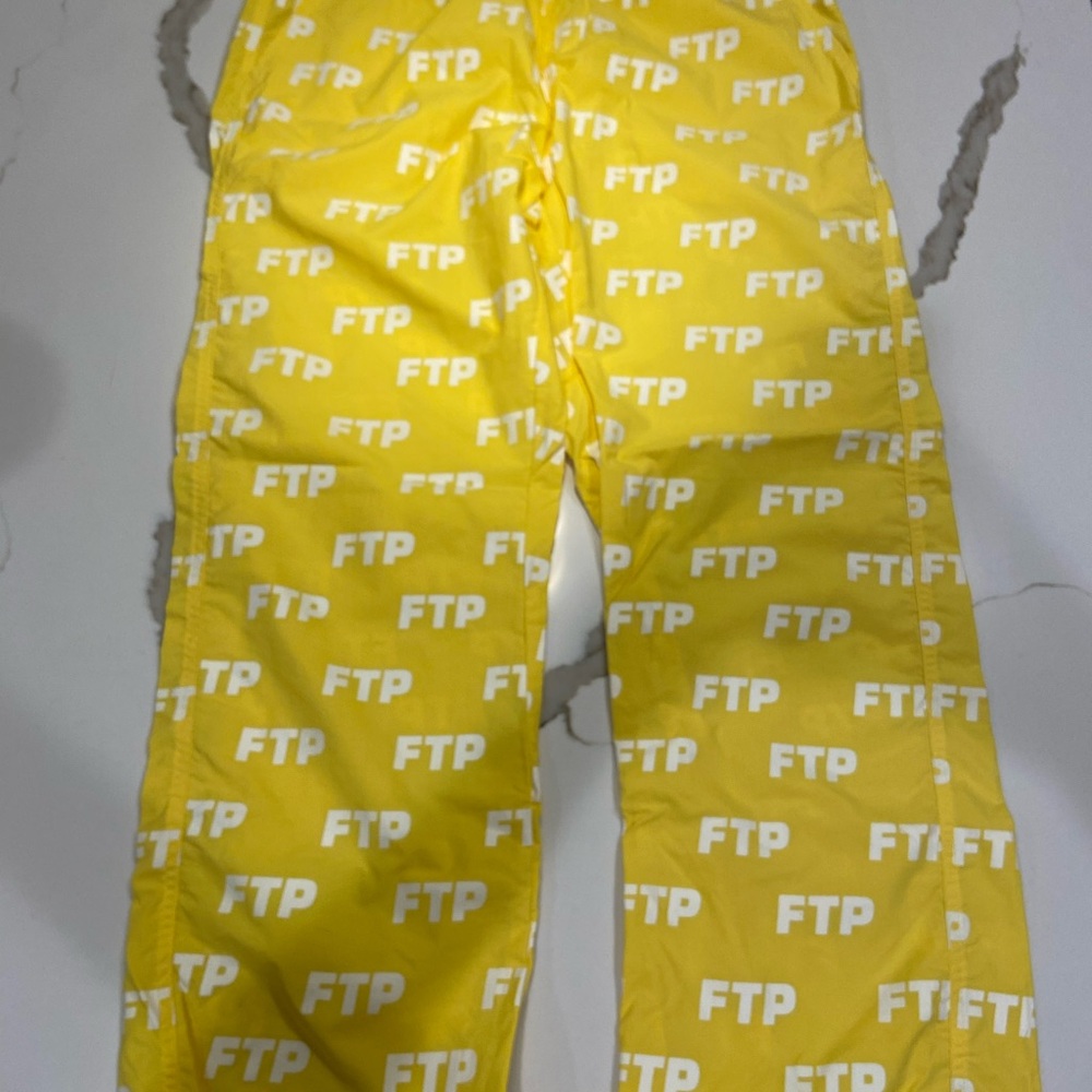 FTP Yellow All Over Logo Pants